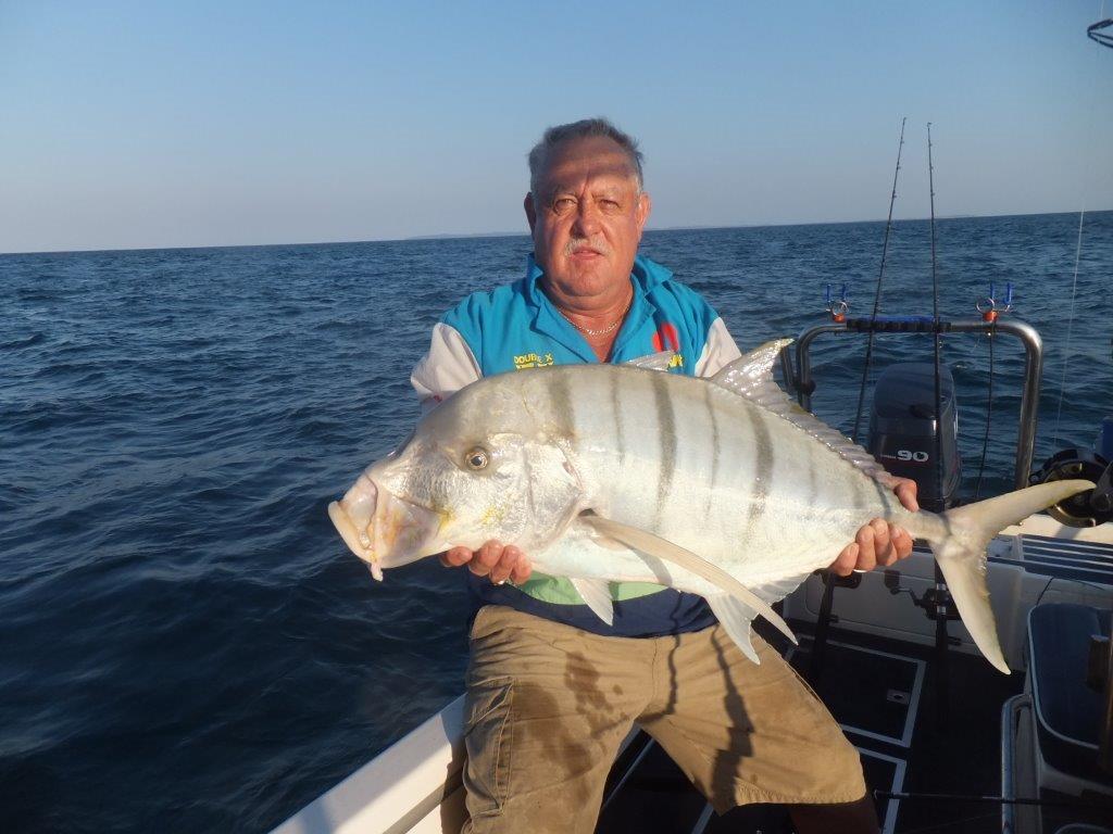 Fishing Mozambique:A really good Golden Trevally or Golden Kingfish, taken on a Gummy Squid Jig
