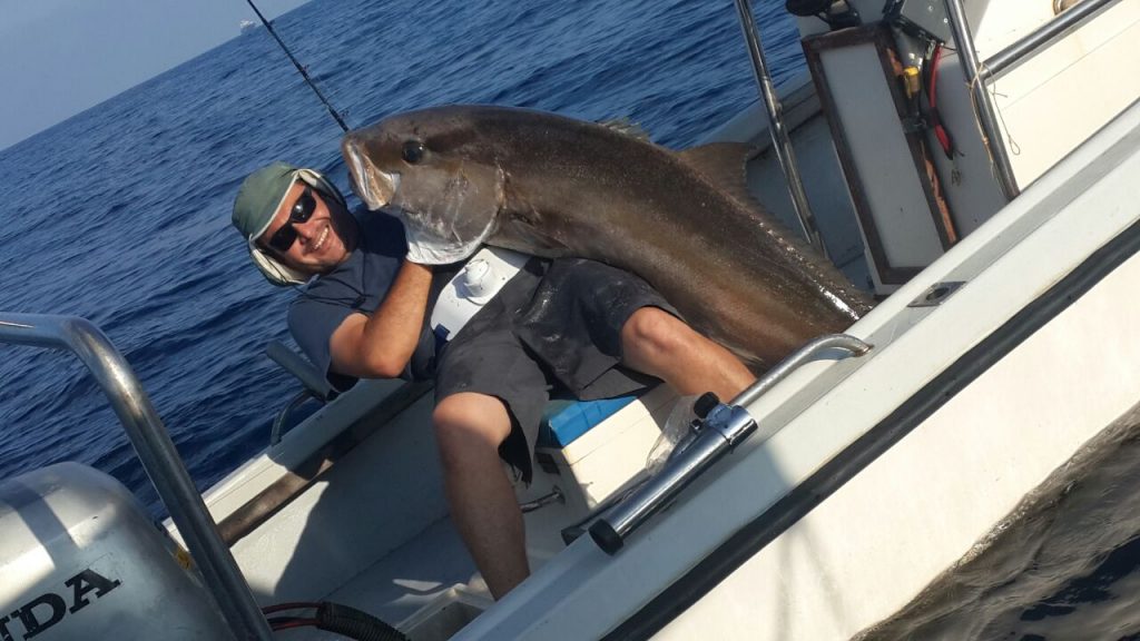 David Kosta and his 43kg Amberjack pulled up from the deep blue Med.