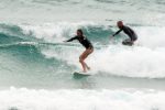 Surfing Tofo shorebreak: Team Mom and Dad Plomaritis leave a few for the kids