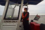 Captain Sean A. Lange at the helm in Maputo to Pomene mission