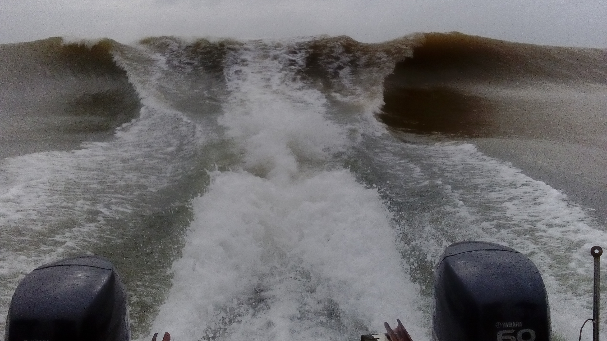 Hometime, sailing back through the Umzimkulu River mouth in Port Shepstone