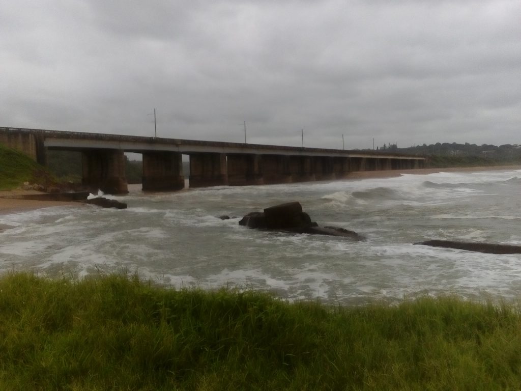 Endless rains are great for farmers but the brown water instils a nervousness as it's full of sharks.