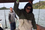 Justin Campbell and the tiniest little black tip kingfish