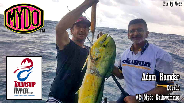 Adam Kamdar of Township Hyper and his delicious dorado taken on a #2 Mydo Baitswimmer