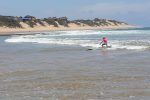 Surfing Tofinho is best started real young. This kids got it down. Yomo!