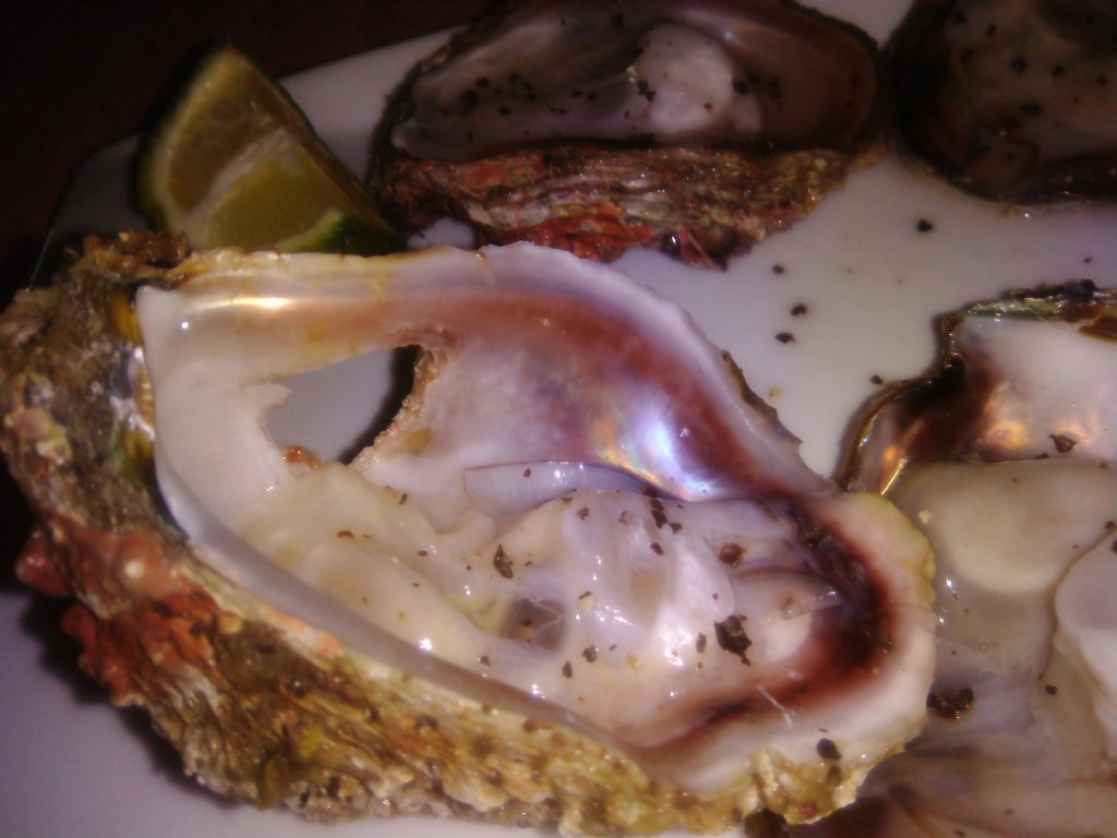 Gulp down an oyster or two at ZanziBeach on the beach of Tofo