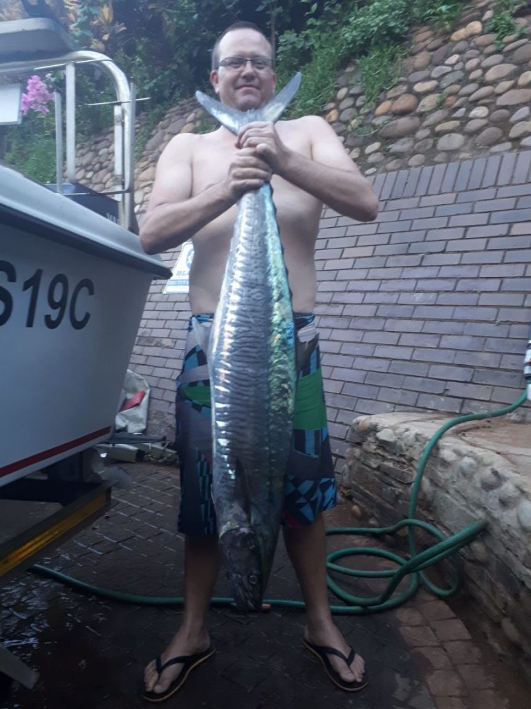 Matt Wainwright and his 15kg 'couta caught with a live mackeral