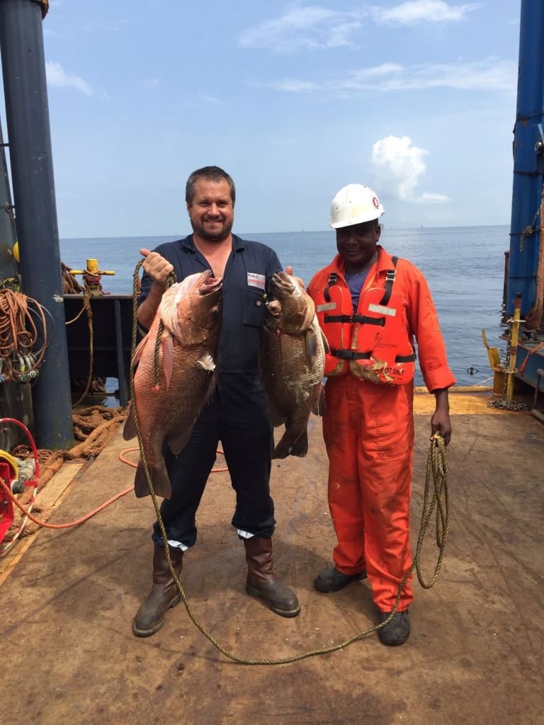 The Cuberra Snappers in Angola get huge too. The fish on the left, well it's a baby.