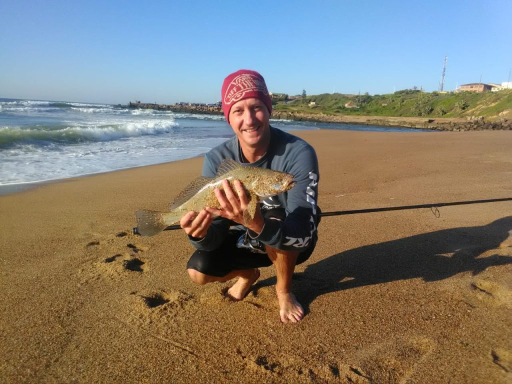 Dallas with a groovy little kob at the SandSpit in Port Shepstone