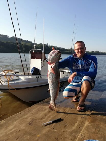 Fishing the brown water in KZN: Matt Wainwright down on the water at the Umzimkulu Marina with a fresh kob