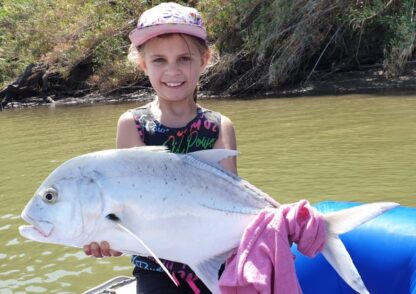 Young Mackenzie Nel and her trophy catch and release GT in the Umzimkulu